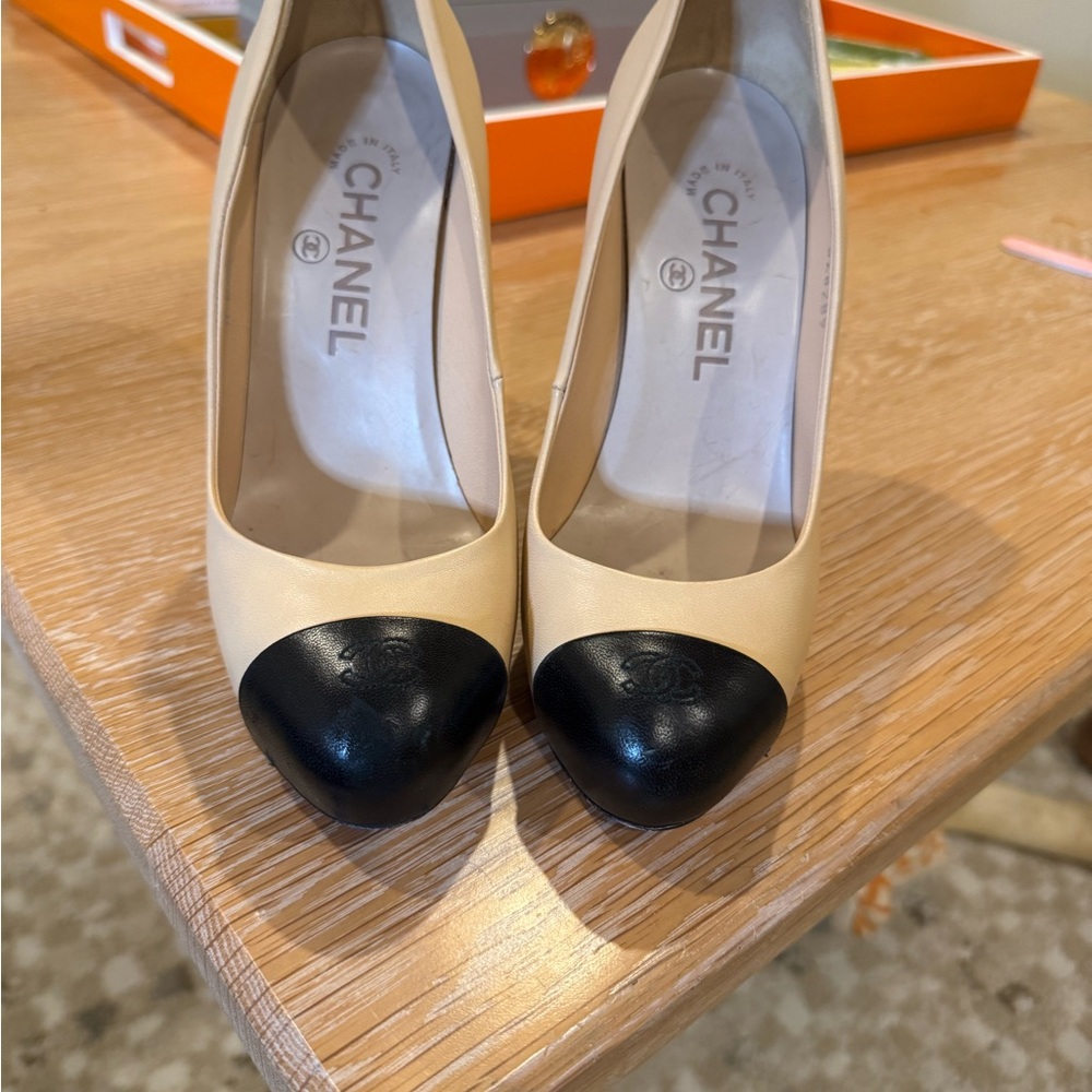 CHANEL Cream and Black Cap-Toe Heels